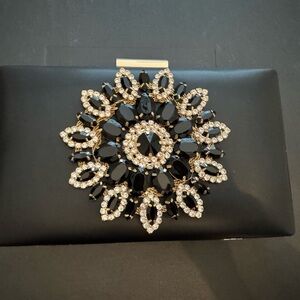 Elegant Black and Gold Brooch